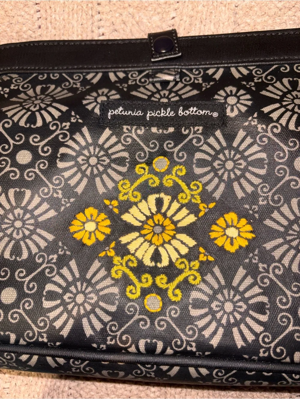 Petunia Pickle Bottom Wristlet Diaper Bag with Changing Pad Floral Black Yellow